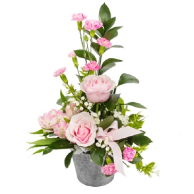 Pot of Happiness - A small but choice selection of flowers arranged in a petite container. Perfect for that token gift.
