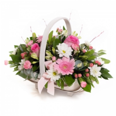 Baby Girl Pink Basket  - A floral basket overflowing with pick and white flowers, neatly arranged with foliage.
