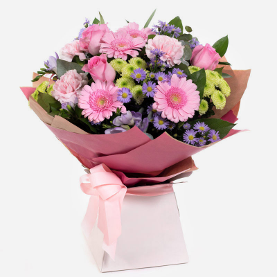 Warm Wishes
 - Send this vibrant hand-tied featuring a mix of favourite flowers delivered in a delightful gift bag or box is the perfect way to deliver your message. 
