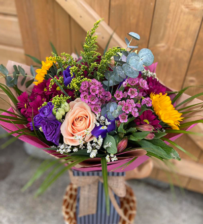 Sweetest Dreams - A lovely handtied in water presented in a gift box. To include flowers in pink, purple, white with complimentary foliage.