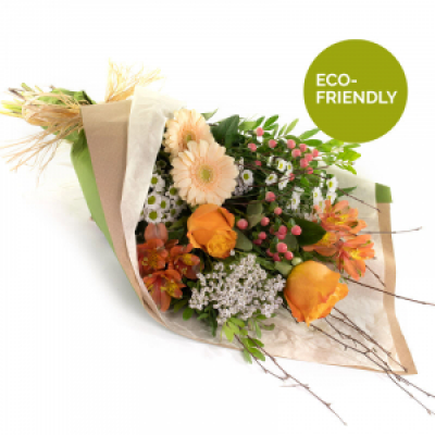 Peaches and Cream - A beautiful collection of flowers simply wrapped and ready to arrange.
